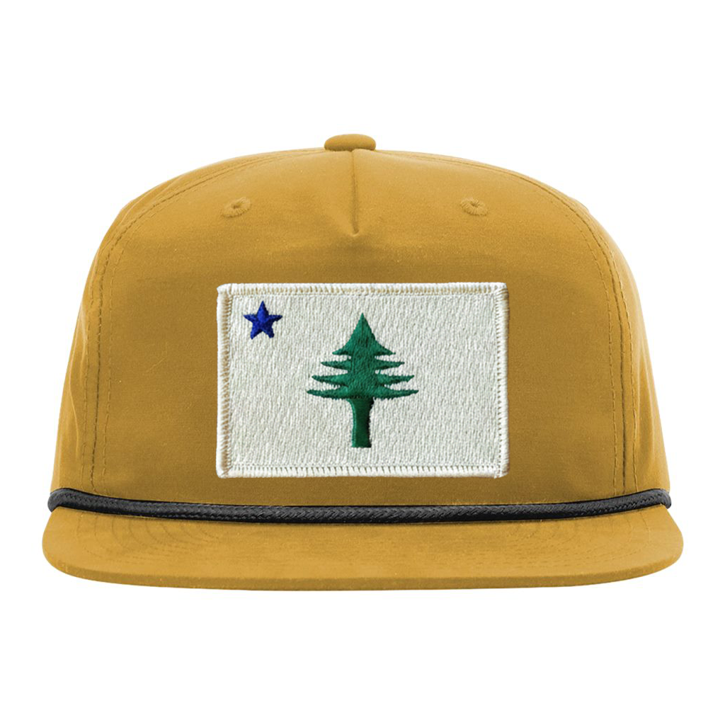 Yellow cap with embroidered design  from the 1901 Maine state flag on a white background