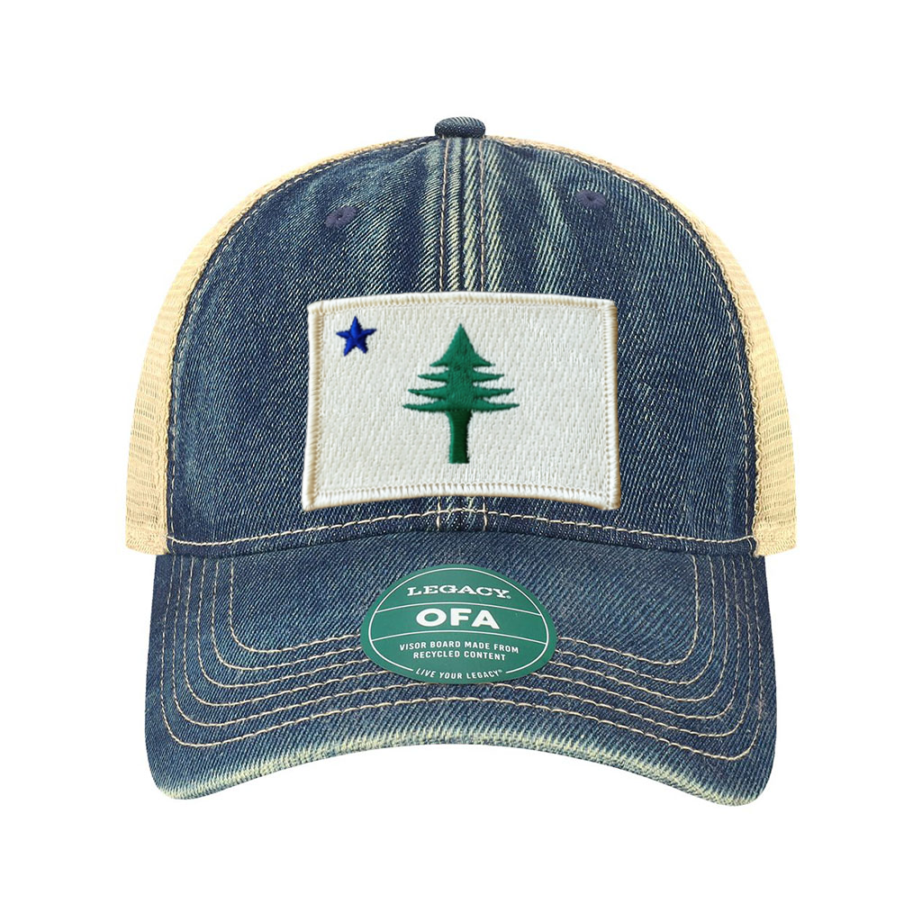Blue denim cap with a white patch featuring a green tree and blue star from the 1901 Maine state flag, on a white background.