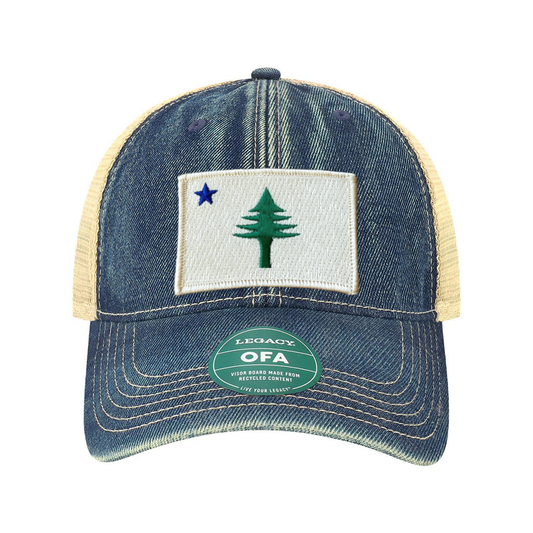 Blue denim cap with a white patch featuring a green tree and blue star from the 1901 Maine state flag, on a white background.