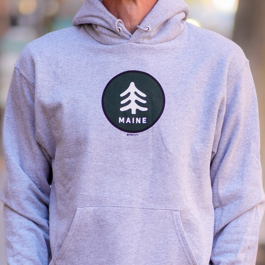 Gray hoodie with a 'MAINE' logo on a blurred background